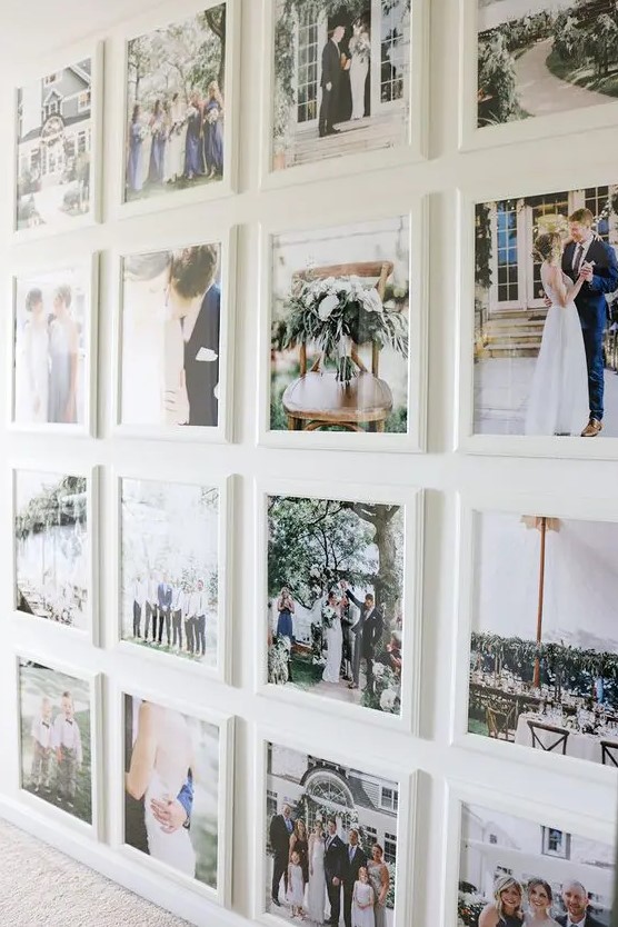 a cool grid gallery wall with white frames and no matting plus colored family pics is pure beauty
