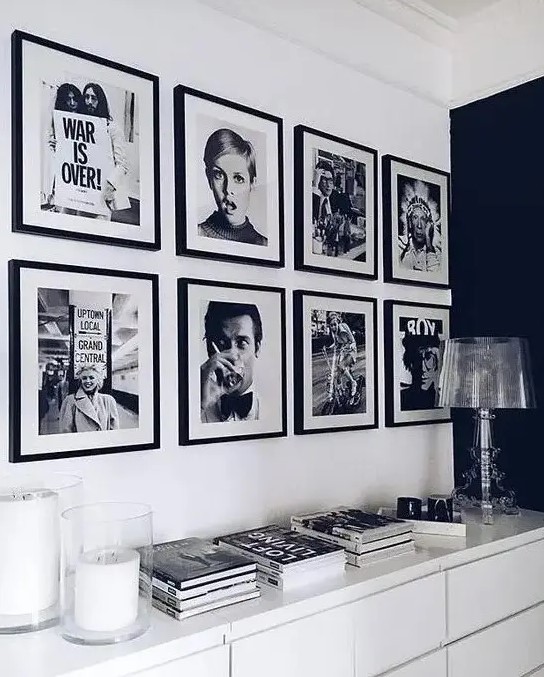 a gorgeous gallery wall with a grid shape and matching black frames is a cool solution for any modern space and it brings chic here