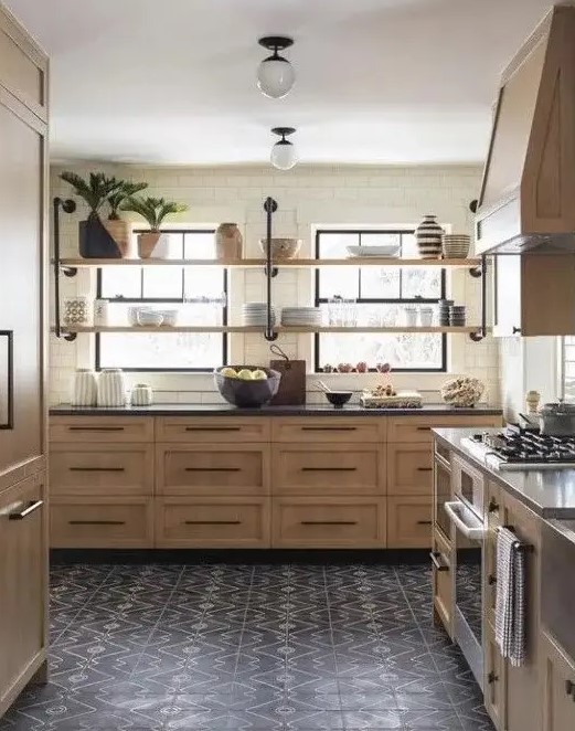 a stained kitchen with shaker style cabinets, black stone countertops and black handles, long open shelves instead of upper cabinets is cool
