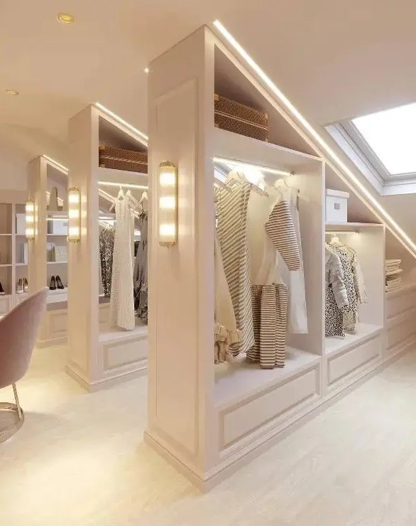 a stylish neutral attic turned into a walk-in closet with open shelving and lights is a gorgeous solution to use your attic space