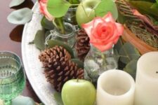 02 a beautiful fall centerpiece of a silver tray, green apples, pinecones, oliage and coral blooms