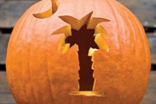 03 a Halloween jack-o-lantern with a palm tree and a moon is a simple and cool idea to make yourself
