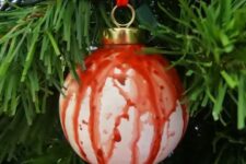 03 a bleeding Halloween ornament on red ribbon can be easily made for holidays, it looks cool and bold