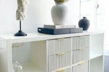 a lovely ikea kallax hack with fluted details