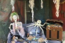 08 a beach Halloween skeleton scene with a tropical skeleton, some jellyfish, an octopus and some greenery