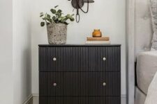 09 a cool IKEA Tarva dresser renovation into a trendy fluted piece with brass knobs, it becomes a functional nightstand