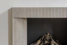 14 a non-working fireplace with a fluted surround will be a stylish and sophisticated addition to your interior