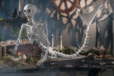 20  a mermaid skeleton would be a great addition to a tropical Halloween arrangement