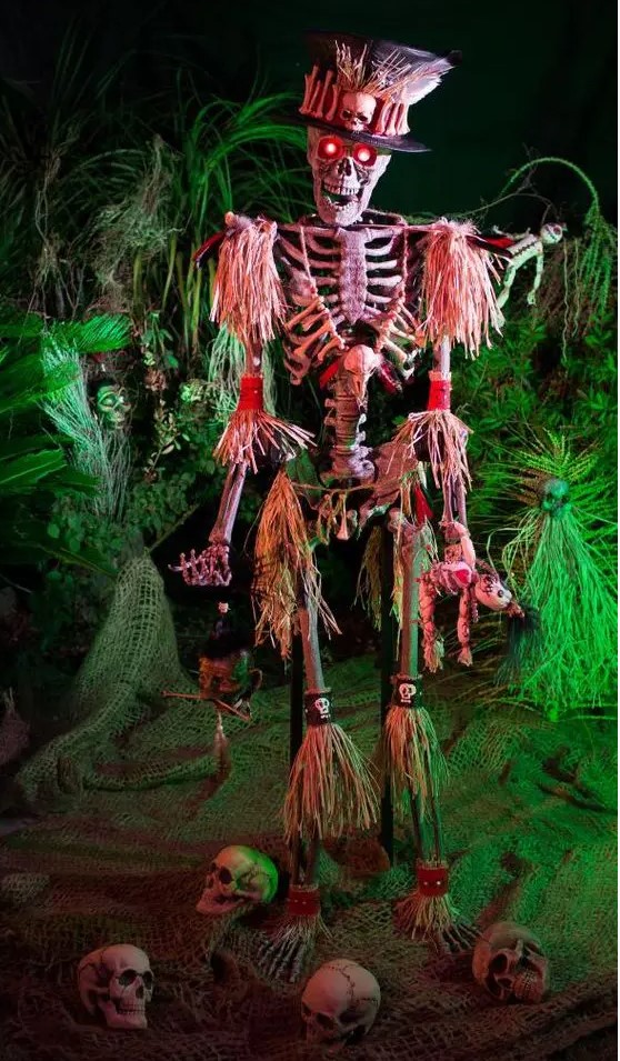 a voodoo skeleton for outdoor decor is a great take on traditional skeleton scenes