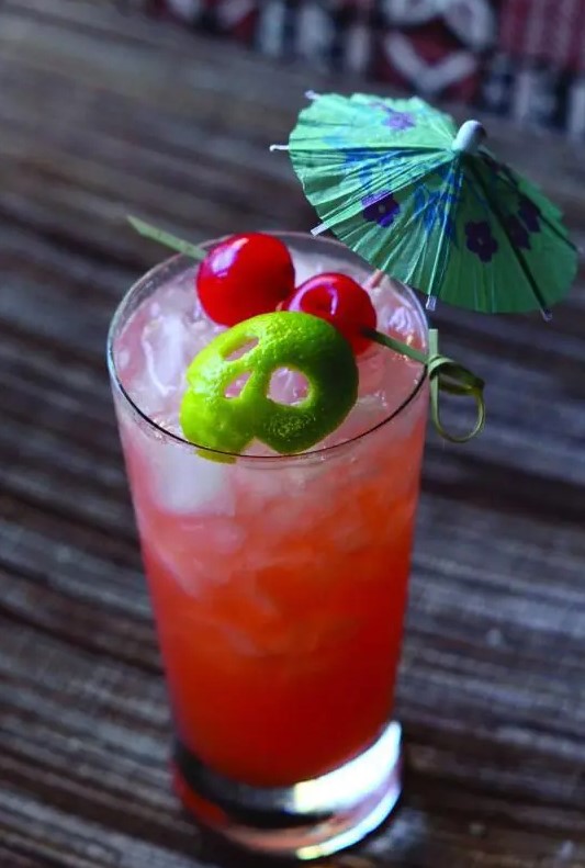 Beachcomber’s Zombie cocktail with a skull cut of a lime is a perfect idea for a tropical Halloween party