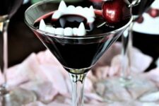 30 a bloody cocktail with jaws and a cherry is a stunning and bold idea for a vampire party