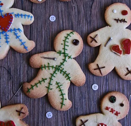 gingerbread cookies as voodoo dolls for treats or favors at a Halloween party with literally any theme