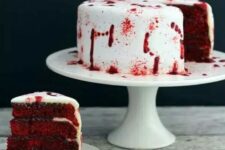 35 a vampire cake in deep red and with blood on the white frosting is a great idea for a Halloween party with vampire style