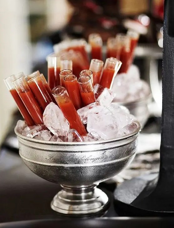 Bloody Mary vials of blood are a super creative and cool idea for an adult vampire party