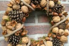 36 a natural rustic wreath of nuts and acorns, pinecones and rope plus some moss is a cool and chic idea for the fall