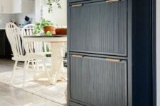 36 an elegant black IKEA Hemnes shoe cabinet hack with fluted panels and gold handles is a stylish idea