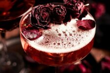 42 gorgeous red Halloween cocktails topped with dried red roses are perfect for a party, they look refined