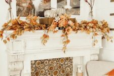 44 fall living room decor with a branch slice screen, fall leaves, heirloom pumpkins, faux pears and bright pillows