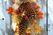 45 a fall posie with fall leaves, pinecones, a burlap bow is a fun and cool fall decoration to hang anywhere