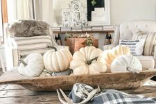 54 a dough bowl with natural and fabric pumpkins in neutrals, a plaid napkin and antlers