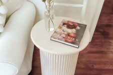56 a white side table with a fluted base is a cool solution for a modern or Scandinavian living room, you can DIY one