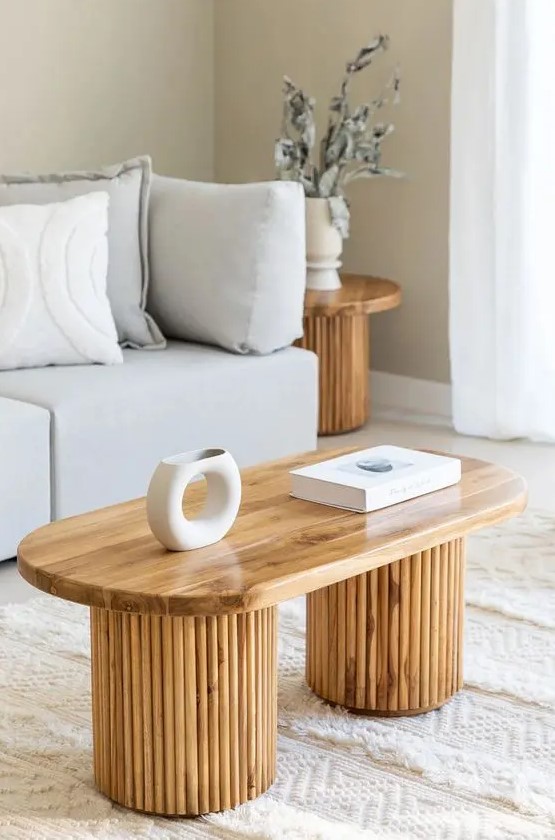a stained coffee table or a bench with fluted legs is a cool idea for a modern or Scandinavian space