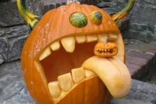 a crazy monster pumpkin with horns eating another, smaller pumpkin, is a bold and catchy idea for Halloween