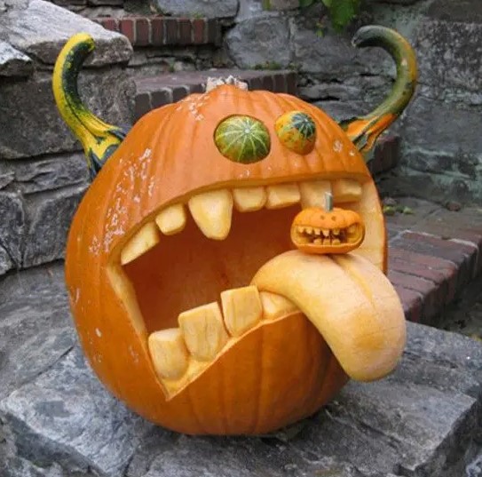 a crazy monster pumpkin with horns eating another, smaller pumpkin, is a bold and catchy idea for Halloween