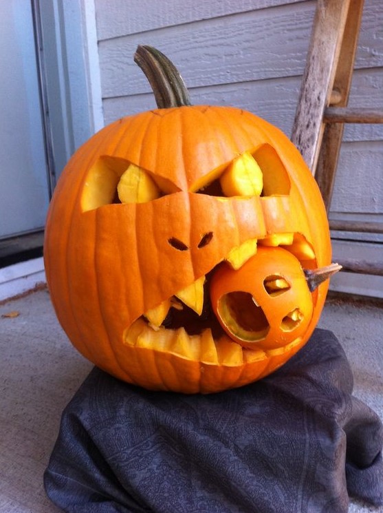 a creepy monster eating pumpking that eats another pumpkin is perfect for Halloween