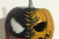 a gorgeous carved and painted Venom pumpkin with teeth is a perfect decoration, it looks stylish and scary