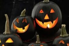 black jack-o-lanterns for decorating outdoors are a stylish ensemble that is absolutely traditional