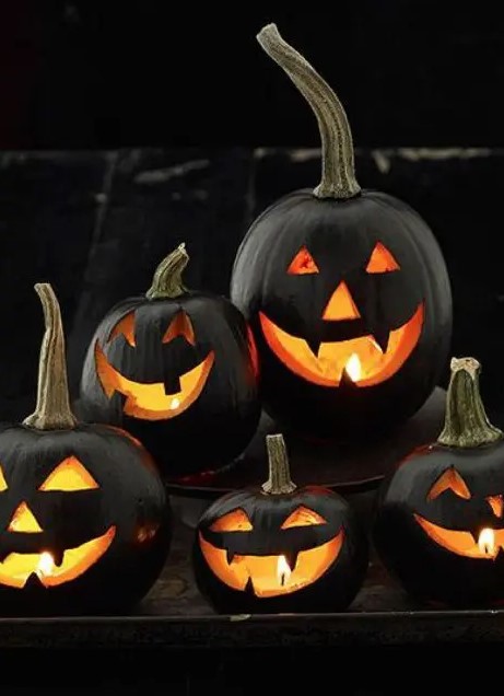 Black jack o lanterns for decorating outdoors are a stylish ensemble that is absolutely traditional