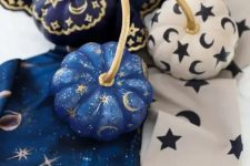 06 very pretty small pumpkins in blue, navy and white, with stars, moons and tiny sparkles are great for celestial Halloween parties