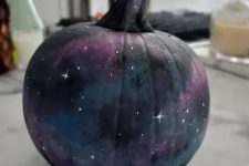 08 a fabulous black, blue, grey, purple galaxy pumpkin with tiny white stars painted is amazing for Halloween decor