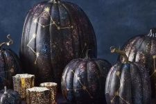 10 an arrangement of jaw-dropping black, purple and blue constellation pumpkins with gold constellations is fantastic