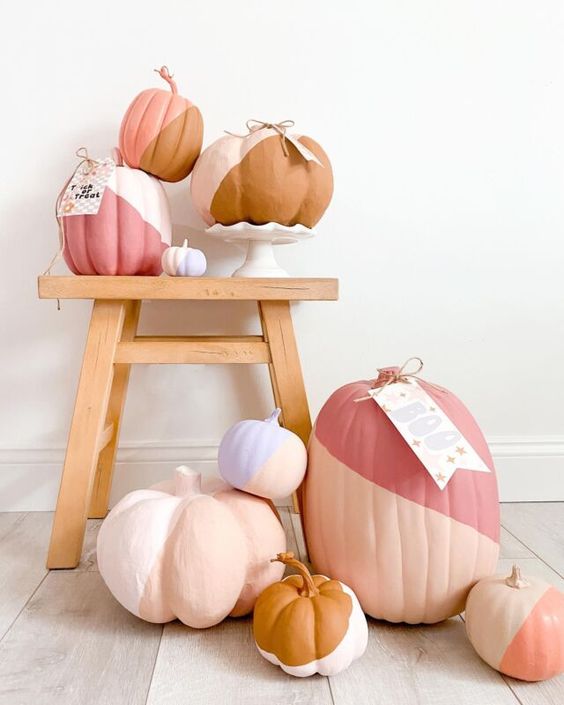beautiful modern color block pumpkins in pastel and muted shades, with tags, are great for styling your space for fall and Halloween