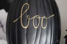 21 a matte black pumpkin with gold calligraphy letters made with a sharpie is a very easy and cool idea