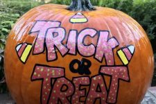 25 a very easy and cool Halloween pumpkin done with bright paints and letters can be easily repeated