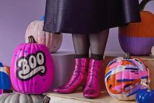 27 super bright and colorful pumpkins in bold shades in pink, blue and orange are amazing for your retro Halloween party