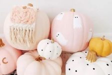 39 an arrangement of cool blush and white pumpkins, with polka dots, ghosts and macrame is amazing