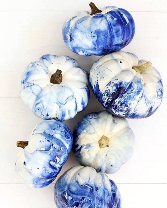 beautiful indgo blue marbled pumpkins are a catchy and chic idea for modern fall or Halloween decor