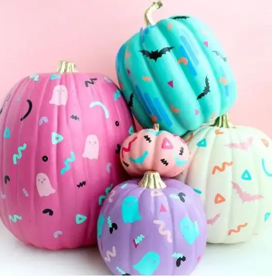 purple, pink, turquoise and neutral pumpkins with fun patterns on them are amazing for Halloween