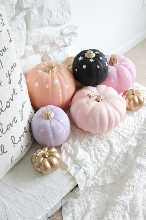 pastel and a black pumpkin with stars are great for fall and Halloween decor in soft shades