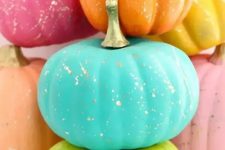 47 neon blue, green, orange, pink and yellow pumpkins with gold splatters are fantastic for Halloween decor
