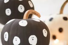 48 make some easy matte black pumpkins with ghosts for your kids’ Halloween party