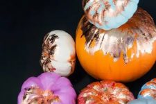 49 give your Halloween decor a big dose of glam with these no-carve copper foil pumpkins
