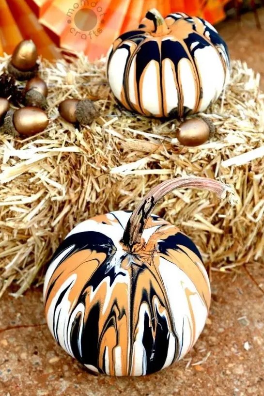 bold black, white and orange marble pumpkins are amazing for Halloween, they look extra bold and cool