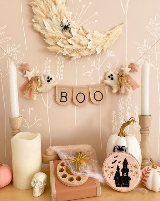 a Halloween banner with letters, little felt pompoms and stars is a cool solution for pastel Halloween decor