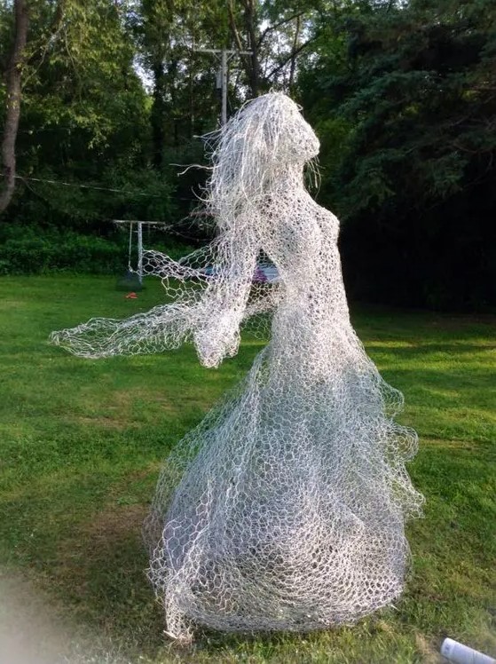 a beautiful chicken wire ghost may be spray painted to glow in the dark, perfect for Halloween decor
