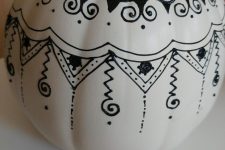 a black and white sharpie decorated Halloween pumpkin is great for boho decor